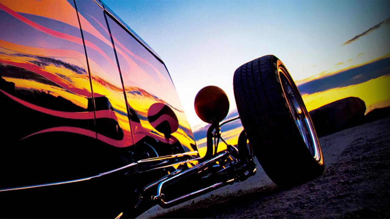 '32 Ford High Boy Roadster with Flames on the beach at sunset