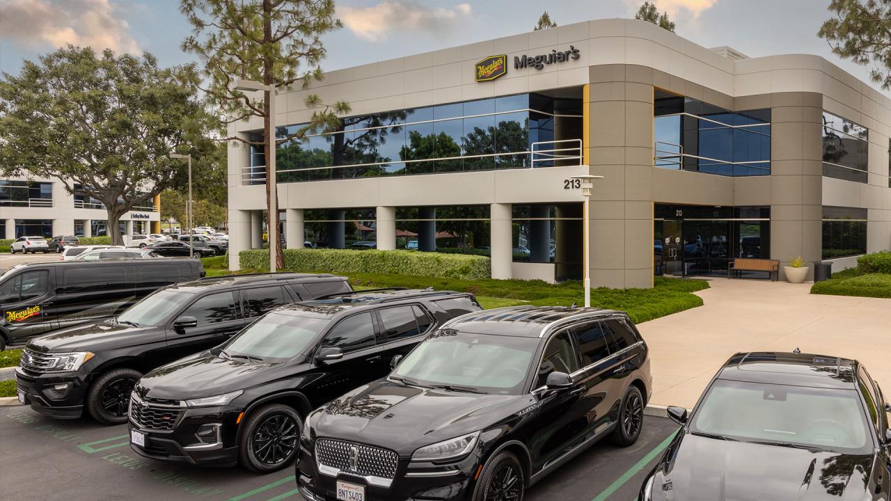 Cars parked in front of the Meguiar's building
