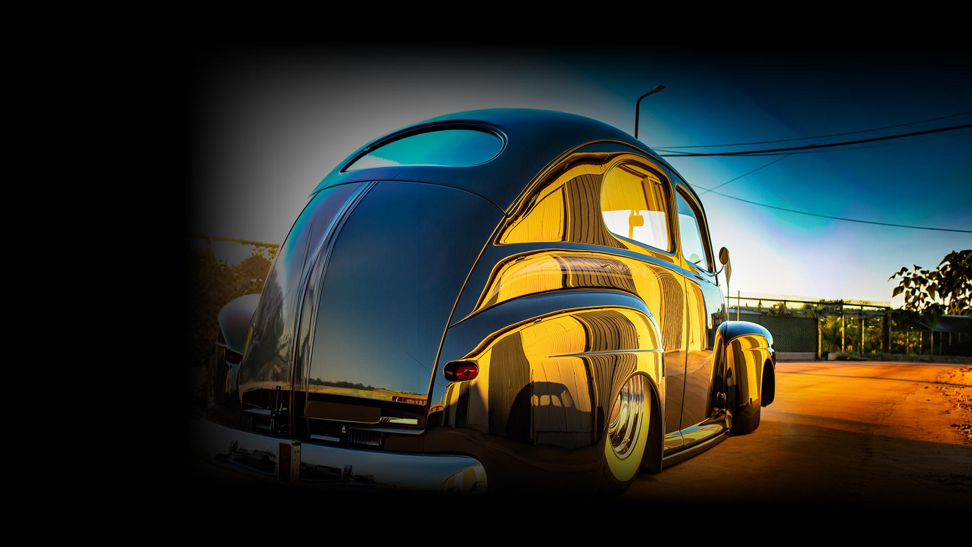 yellow toned image of a roadster