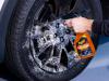 G230524 Hot Rims Black Wheel Cleaner being sprayed onto a black wheel